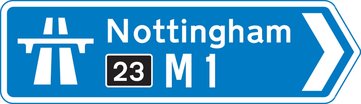 image of at a junction leading directly into a motorway road sign